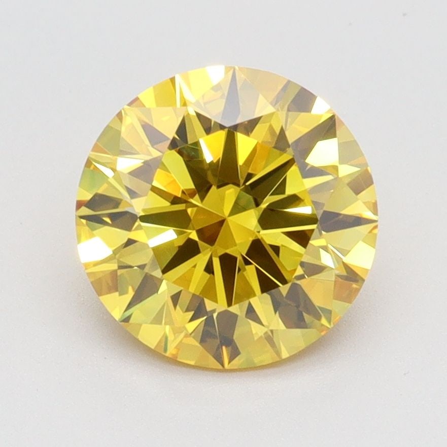Loose Diamond - ROUND 2.0ct Fancy Vivid Yellow VVS2: Loose Diamond - ROUND 2.0ct Fancy Vivid Yellow VVS2 Source: This is a real non-mined Diamond that has been grown in a lab Shape: ROUND Carats: 2.0 Color: Fancy Vivid Yellow Certification: IGI Video: