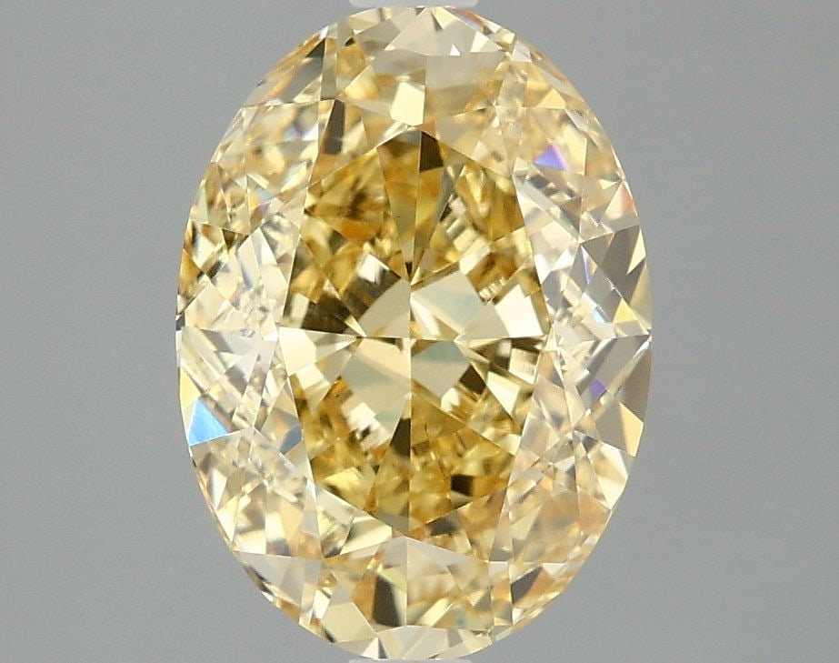 Loose Diamond - OVAL 3.01ct Fancy Intense Yellow VVS2: Loose Diamond - OVAL 3.01ct Fancy Intense Yellow VVS2 Source: This is a real non-mined Diamond that has been grown in a lab Shape: OVAL Carats: 3.01 Color: Fancy Intense Yellow Certification: IGI Vide