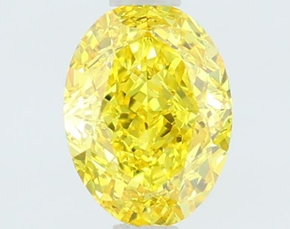 Loose Diamond - OVAL 1.12ct Fancy Vivid Yellow VVS2: Loose Diamond - OVAL 1.12ct Fancy Vivid Yellow VVS2 Source: This is a real non-mined Diamond that has been grown in a lab Shape: OVAL Carats: 1.12 Color: Fancy Vivid Yellow Certification: IGI Video: