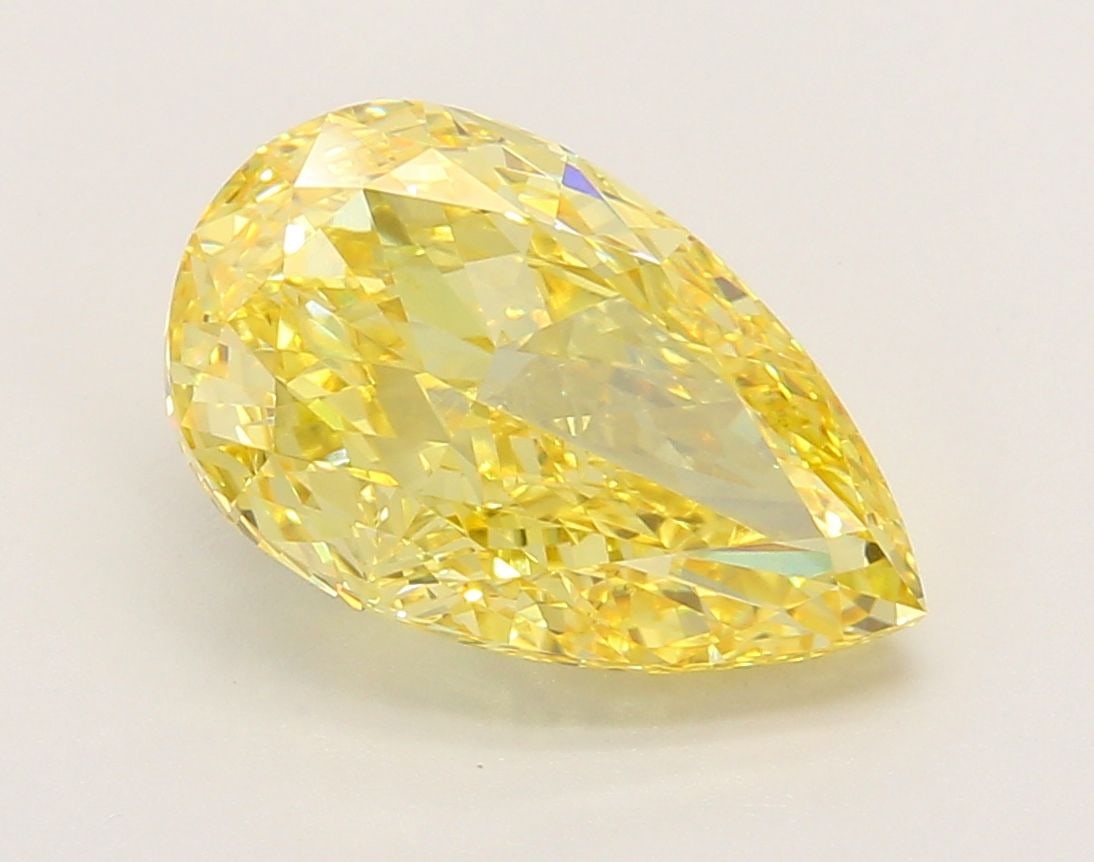 Loose Diamond - PEAR 4.02ct Fancy Vivid Yellow VVS2: Loose Diamond - PEAR 4.02ct Fancy Vivid Yellow VVS2 Source: This is a real non-mined Diamond that has been grown in a lab Shape: PEAR Carats: 4.02 Color: Fancy Vivid Yellow Certification: IGI Video: