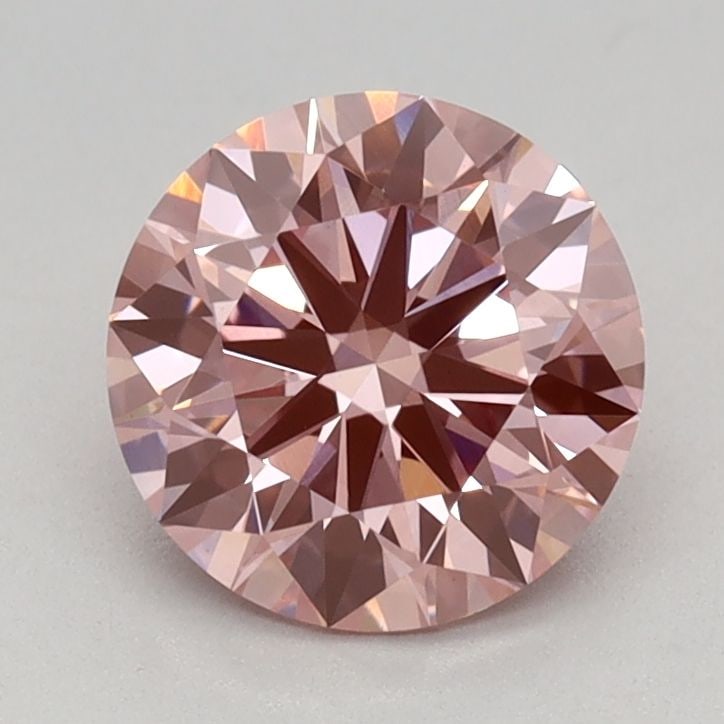Ideal Loose Diamond - ROUND 0.96ct Fancy Vivid Pink VS1: Ideal Loose Diamond - ROUND 0.96ct Fancy Vivid Pink VS1 Source: This is a real non-mined Diamond that has been grown in a lab Shape: ROUND Carats: 0.96 Color: Fancy Vivid Pink Certification: IGI Video