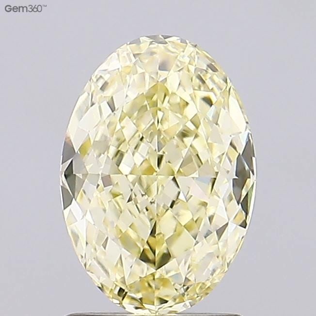 Loose Diamond - OVAL 1.65ct Fancy Light Yellow VVS2: Loose Diamond - OVAL 1.65ct Fancy Light Yellow VVS2 Source: This is a real non-mined Diamond that has been grown in a lab Shape: OVAL Carats: 1.65 Color: Fancy Light Yellow Certification: IGI Video: