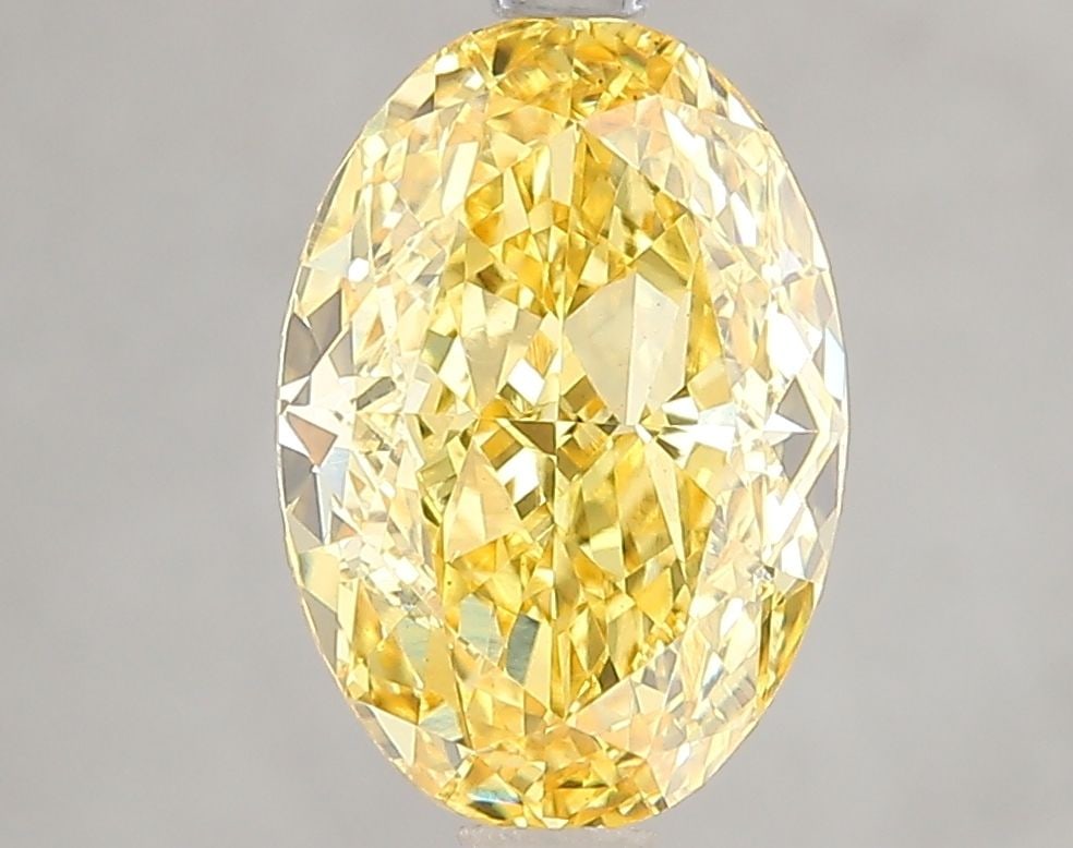 Loose Diamond - OVAL 3.05ct Fancy Vivid Yellow VS1: Loose Diamond - OVAL 3.05ct Fancy Vivid Yellow VS1 Source: This is a real non-mined Diamond that has been grown in a lab Shape: OVAL Carats: 3.05 Color: Fancy Vivid Yellow Certification: IGI Video:
