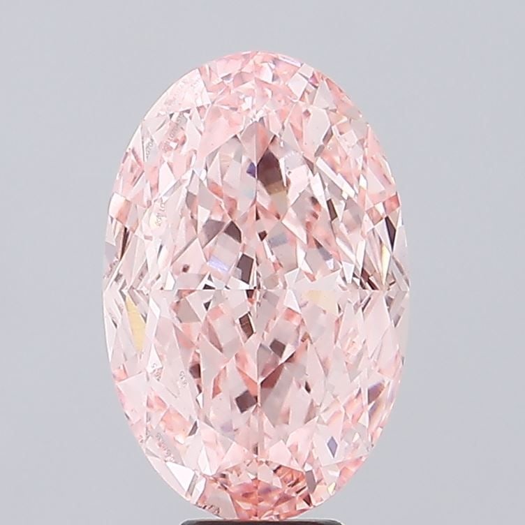 Loose Diamond - OVAL 10.52ct Fancy Vivid Pink VS2: Loose Diamond - OVAL 10.52ct Fancy Vivid Pink VS2 Source: This is a real non-mined Diamond that has been grown in a lab Shape: OVAL Carats: 10.52 Color: Fancy Vivid Pink Certification: IGI Video: