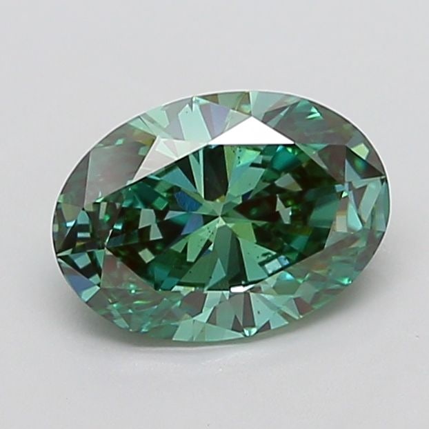 Loose Diamond - OVAL 2.9ct Fancy Vivid Green VS2: Loose Diamond - OVAL 2.9ct Fancy Vivid Green VS2 Source: This is a real non-mined Diamond that has been grown in a lab Shape: OVAL Carats: 2.9 Color: Fancy Vivid Green Certification: IGI Video: