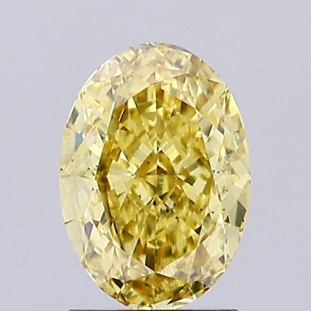 Loose Diamond - OVAL 1.59ct Fancy Vivid Yellow SI1: Loose Diamond - OVAL 1.59ct Fancy Vivid Yellow SI1 Source: This is a real non-mined Diamond that has been grown in a lab Shape: OVAL Carats: 1.59 Color: Fancy Vivid Yellow Certification: IGI Video: