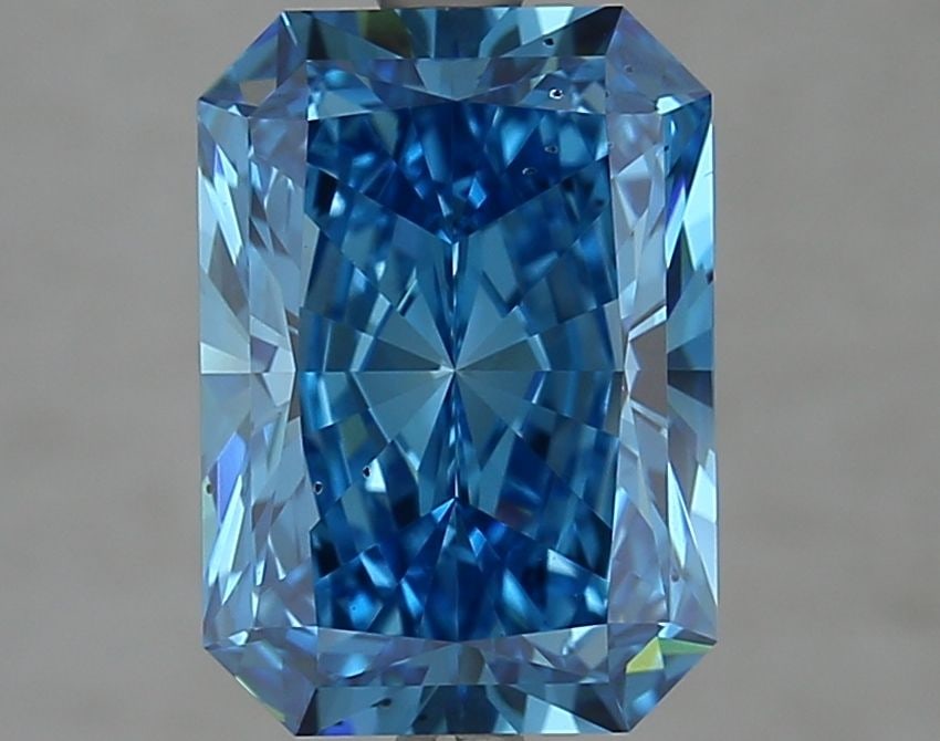 Loose Diamond - RADIANT 3.59ct Fancy Vivid Blue SI1: Loose Diamond - RADIANT 3.59ct Fancy Vivid Blue SI1 Source: This is a real non-mined Diamond that has been grown in a lab Shape: RADIANT Carats: 3.59 Color: Fancy Vivid Blue Certification: IGI Video: