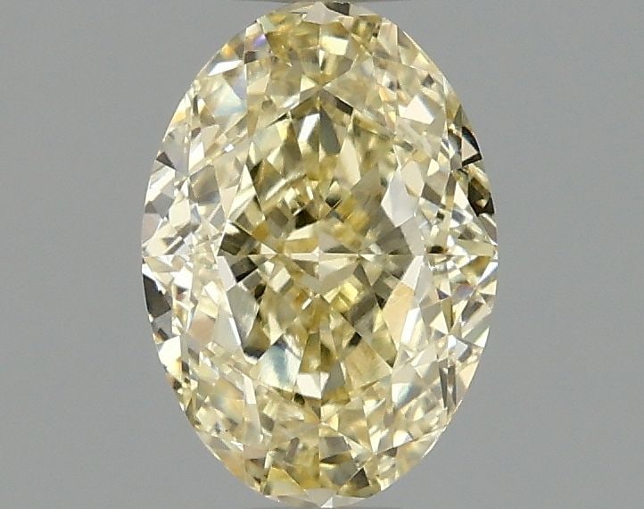 Loose Diamond - OVAL 1.09ct Fancy Yellow VS1: Loose Diamond - OVAL 1.09ct Fancy Yellow VS1 Source: This is a real non-mined Diamond that has been grown in a lab Shape: OVAL Carats: 1.09 Color: Fancy Yellow Certification: IGI Video: