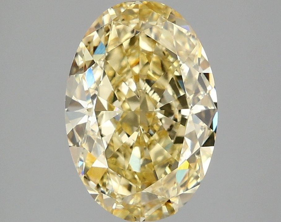 Loose Diamond - OVAL 3.1ct Fancy Intense Yellow VVS2: Loose Diamond - OVAL 3.1ct Fancy Intense Yellow VVS2 Source: This is a real non-mined Diamond that has been grown in a lab Shape: OVAL Carats: 3.1 Color: Fancy Intense Yellow Certification: IGI Video: