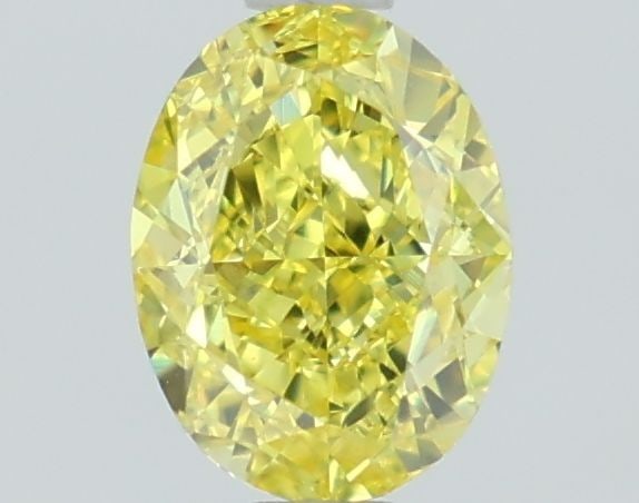 Loose Diamond - OVAL 1.11ct Fancy Vivid Yellow VS1: Loose Diamond - OVAL 1.11ct Fancy Vivid Yellow VS1 Source: This is a real non-mined Diamond that has been grown in a lab Shape: OVAL Carats: 1.11 Color: Fancy Vivid Yellow Certification: IGI Video: