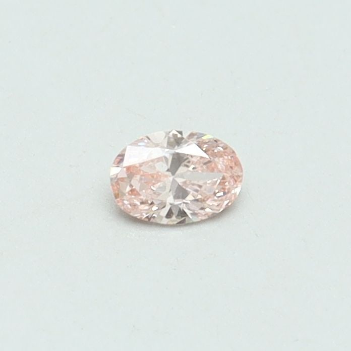 Loose Diamond - OVAL 0.1ct Fancy Vivid Pink VS1: Loose Diamond - OVAL 0.1ct Fancy Vivid Pink VS1 Source: This is a real non-mined Diamond that has been grown in a lab Shape: OVAL Carats: 0.1 Color: Fancy Vivid Pink Certification: IGI Video: