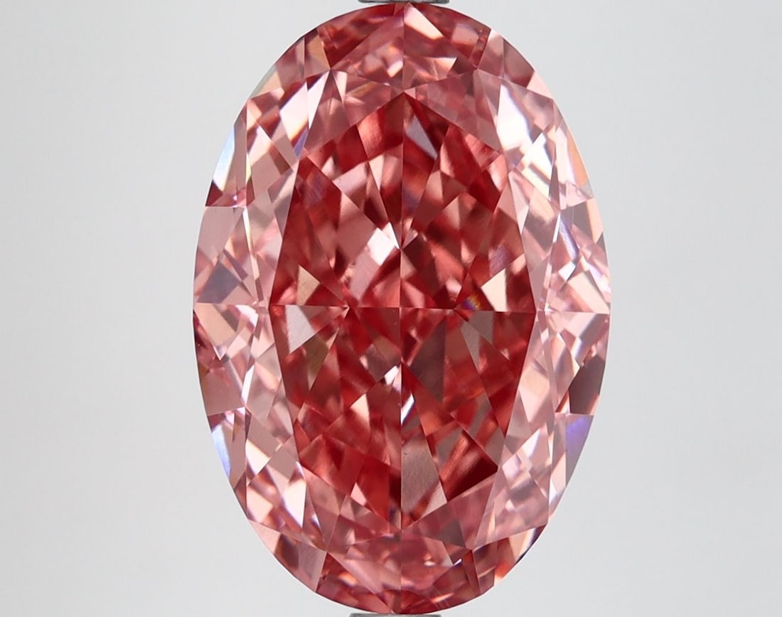 Loose Diamond - OVAL 6.58ct Fancy Vivid Pink VVS2: Loose Diamond - OVAL 6.58ct Fancy Vivid Pink VVS2 Source: This is a real non-mined Diamond that has been grown in a lab Shape: OVAL Carats: 6.58 Color: Fancy Vivid Pink Certification: IGI Video: