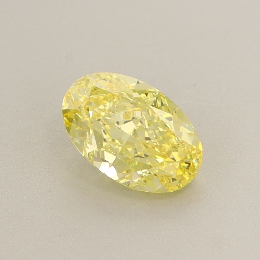 Loose Diamond - OVAL 1.04ct Fancy Vivid Yellow VVS2: Loose Diamond - OVAL 1.04ct Fancy Vivid Yellow VVS2 Source: This is a real non-mined Diamond that has been grown in a lab Shape: OVAL Carats: 1.04 Color: Fancy Vivid Yellow Certification: IGI Video: