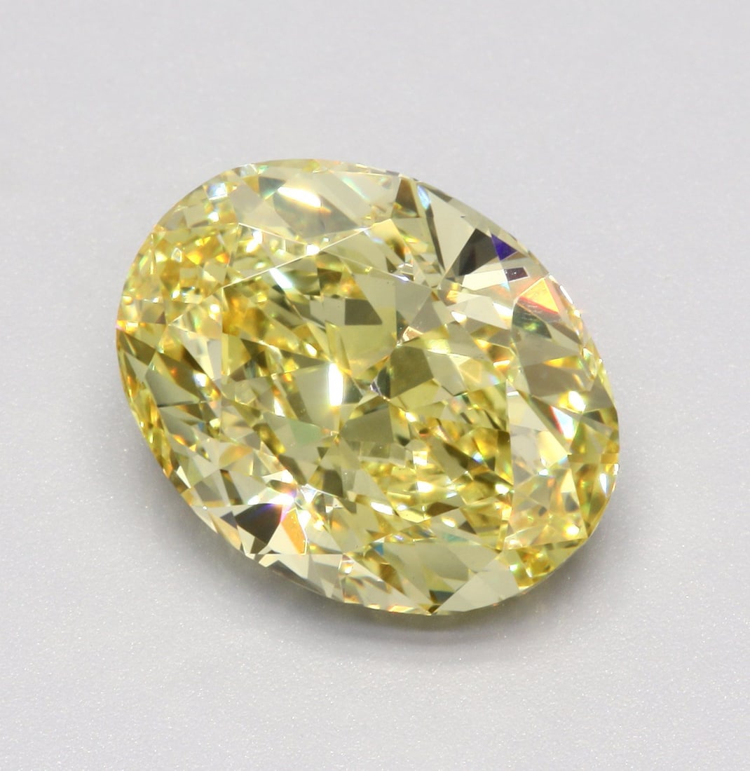 Loose Diamond - OVAL 6.0ct Fancy Intense Yellow VS2: Loose Diamond - OVAL 6.0ct Fancy Intense Yellow VS2 Source: This is a real non-mined Diamond that has been grown in a lab Shape: OVAL Carats: 6.0 Color: Fancy Intense Yellow Certification: IGI Video:
