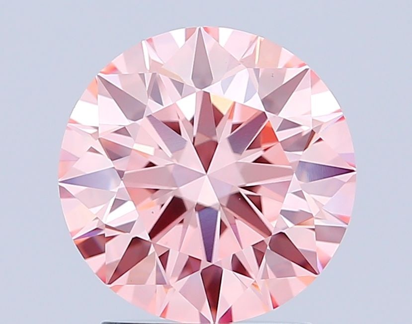 Ideal Loose Diamond - ROUND 2.1ct Fancy Intense Pink VS1: Ideal Loose Diamond - ROUND 2.1ct Fancy Intense Pink VS1 Source: This is a real non-mined Diamond that has been grown in a lab Shape: ROUND Carats: 2.1 Color: Fancy Intense Pink Certification: IGI Vid