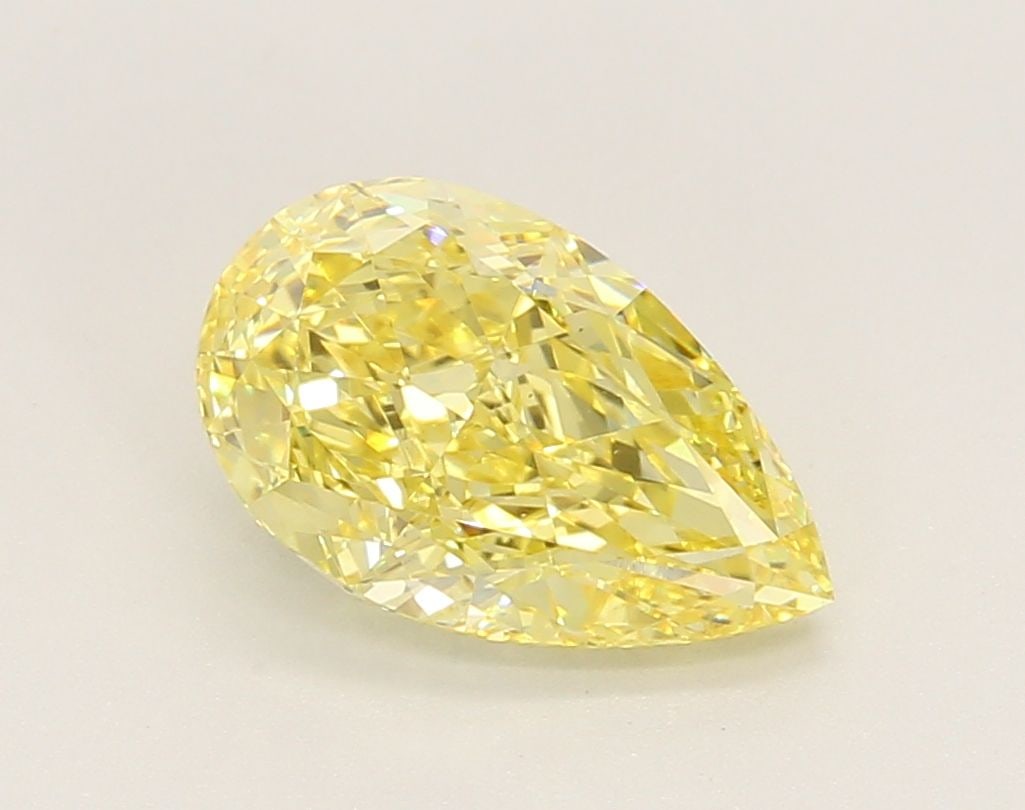 Loose Diamond - PEAR 2.04ct Fancy Vivid Yellow VS1: Loose Diamond - PEAR 2.04ct Fancy Vivid Yellow VS1 Source: This is a real non-mined Diamond that has been grown in a lab Shape: PEAR Carats: 2.04 Color: Fancy Vivid Yellow Certification: IGI Video: