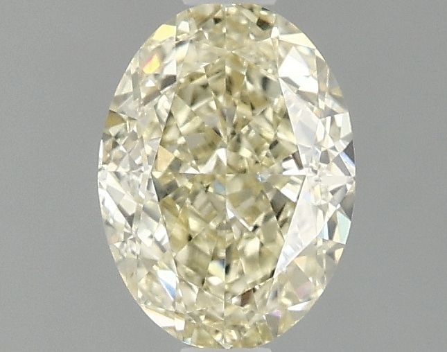 Loose Diamond - OVAL 1.1ct Fancy Yellow VS1: Loose Diamond - OVAL 1.1ct Fancy Yellow VS1 Source: This is a real non-mined Diamond that has been grown in a lab Shape: OVAL Carats: 1.1 Color: Fancy Yellow Certification: IGI Video: