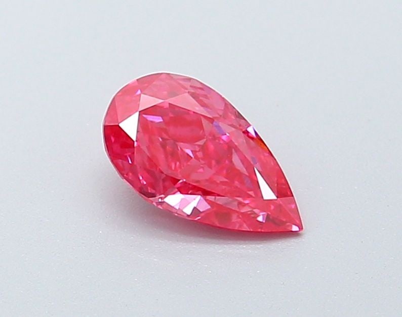 Loose Diamond - PEAR 0.69ct Fancy Vivid Pink VS2: Loose Diamond - PEAR 0.69ct Fancy Vivid Pink VS2 Source: This is a real non-mined Diamond that has been grown in a lab Shape: PEAR Carats: 0.69 Color: Fancy Vivid Pink Certification: IGI Video: