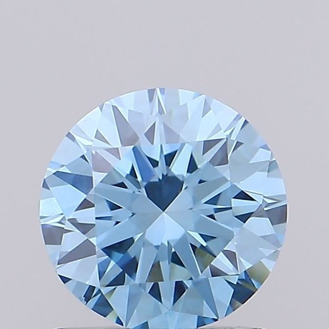 Loose Diamond - ROUND 0.79ct Fancy Vivid Blue VS1: Loose Diamond - ROUND 0.79ct Fancy Vivid Blue VS1 Source: This is a real non-mined Diamond that has been grown in a lab Shape: ROUND Carats: 0.79 Color: Fancy Vivid Blue Certification: IGI Video: