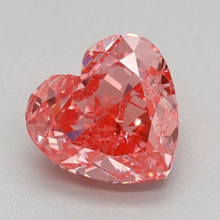 Loose Diamond - HEART 0.97ct Fancy Vivid Pink VVS2: Loose Diamond - HEART 0.97ct Fancy Vivid Pink VVS2 Source: This is a real non-mined Diamond that has been grown in a lab Shape: HEART Carats: 0.97 Color: Fancy Vivid Pink Certification: IGI Video:
