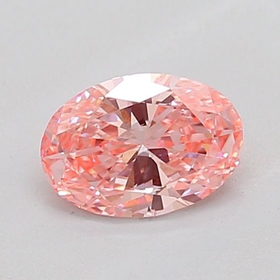 Loose Diamond - OVAL 0.52ct Fancy Vivid Pink VS2: Loose Diamond - OVAL 0.52ct Fancy Vivid Pink VS2 Source: This is a real non-mined Diamond that has been grown in a lab Shape: OVAL Carats: 0.52 Color: Fancy Vivid Pink Certification: IGI Additional im