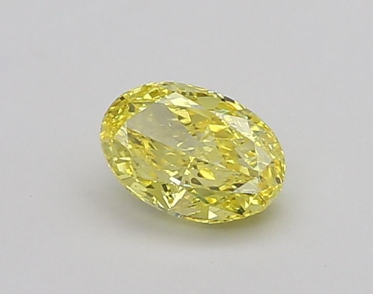 Loose Diamond - OVAL 1.21ct Fancy Vivid Yellow VS1: Loose Diamond - OVAL 1.21ct Fancy Vivid Yellow VS1 Source: This is a real non-mined Diamond that has been grown in a lab Shape: OVAL Carats: 1.21 Color: Fancy Vivid Yellow Certification: IGI Video: