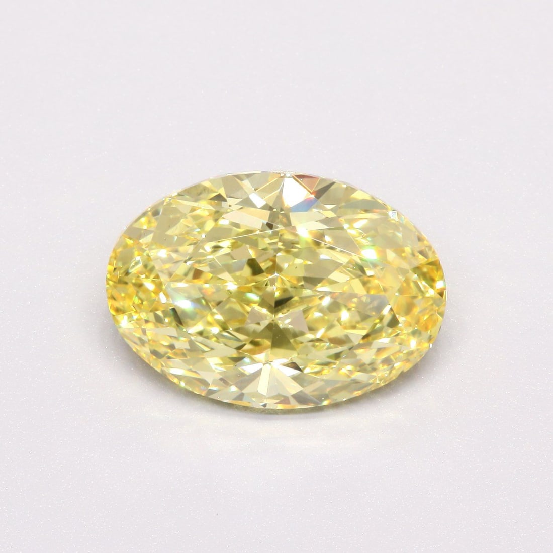 Loose Diamond - OVAL 5.02ct Fancy Vivid Yellow VS1: Loose Diamond - OVAL 5.02ct Fancy Vivid Yellow VS1 Source: This is a real non-mined Diamond that has been grown in a lab Shape: OVAL Carats: 5.02 Color: Fancy Vivid Yellow Certification: IGI Video:
