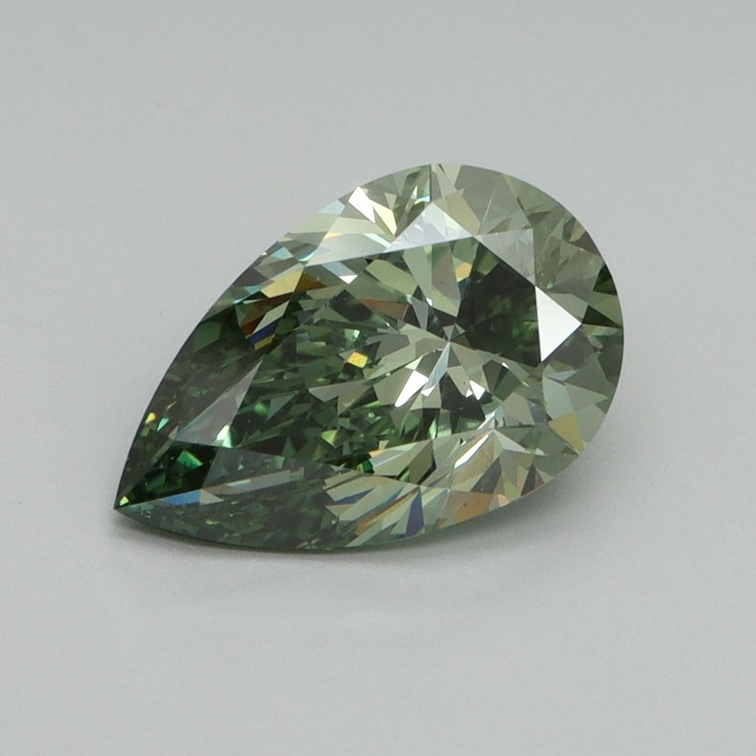 Loose Diamond - PEAR 2.1ct Fancy Vivid Green VS1: Loose Diamond - PEAR 2.1ct Fancy Vivid Green VS1 Source: This is a real non-mined Diamond that has been grown in a lab Shape: PEAR Carats: 2.1 Color: Fancy Vivid Green Certification: IGI Video: