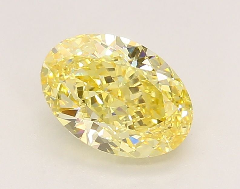 Loose Diamond - OVAL 1.59ct Fancy Vivid Yellow VS1: Loose Diamond - OVAL 1.59ct Fancy Vivid Yellow VS1 Source: This is a real non-mined Diamond that has been grown in a lab Shape: OVAL Carats: 1.59 Color: Fancy Vivid Yellow Certification: IGI Video: