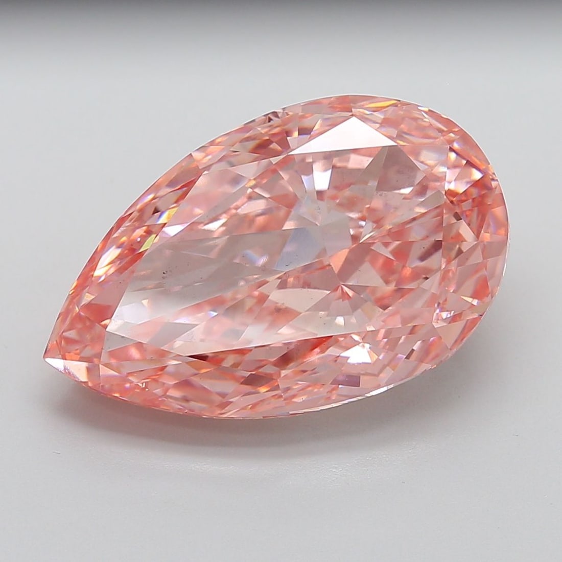 Loose Diamond - PEAR 20.17ct Fancy Vivid Pink VS2: Loose Diamond - PEAR 20.17ct Fancy Vivid Pink VS2 Source: This is a real non-mined Diamond that has been grown in a lab Shape: PEAR Carats: 20.17 Color: Fancy Vivid Pink Certification: IGI Additional