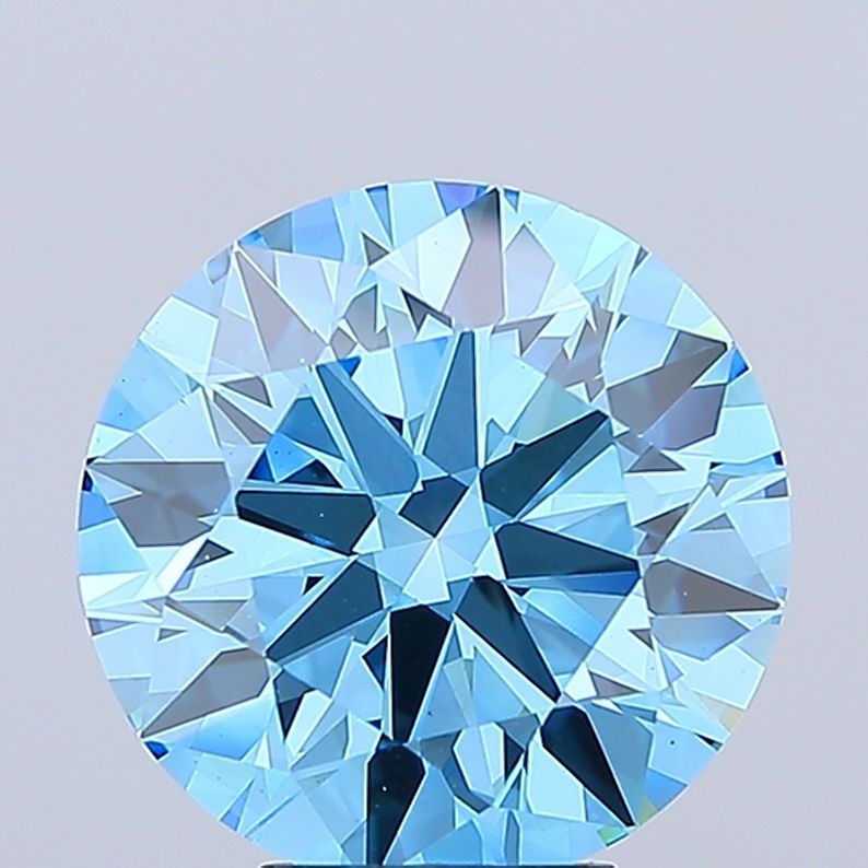 Loose Diamond - ROUND 6.0ct Fancy Vivid Blue VS1: Loose Diamond - ROUND 6.0ct Fancy Vivid Blue VS1 Source: This is a real non-mined Diamond that has been grown in a lab Shape: ROUND Carats: 6.0 Color: Fancy Vivid Blue Certification: IGI Video: