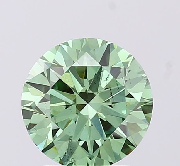 Loose Diamond - ROUND 1.7ct Fancy Vivid Green SI1: Loose Diamond - ROUND 1.7ct Fancy Vivid Green SI1 Source: This is a real non-mined Diamond that has been grown in a lab Shape: ROUND Carats: 1.7 Color: Fancy Vivid Green Certification: IGI 