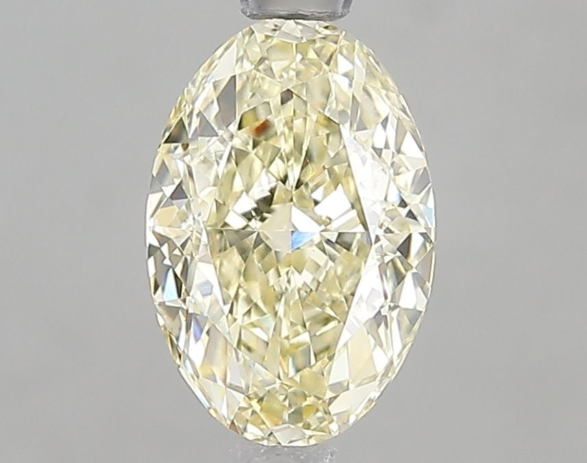 Loose Diamond - OVAL 1.56ct Fancy Yellow VS1: Loose Diamond - OVAL 1.56ct Fancy Yellow VS1 Source: This is a real non-mined Diamond that has been grown in a lab Shape: OVAL Carats: 1.56 Color: Fancy Yellow Certification: IGI Video: