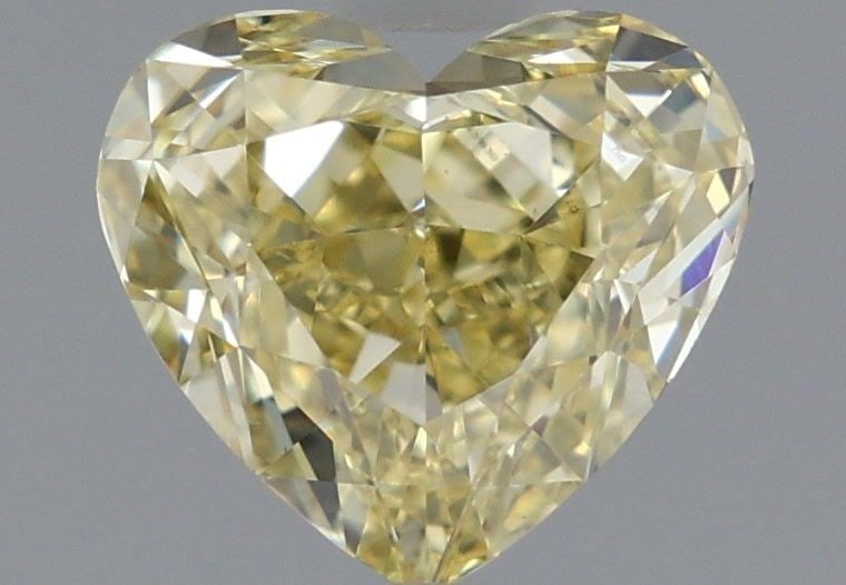 Loose Diamond - HEART 1.33ct Fancy Intense Yellow VS1: Loose Diamond - HEART 1.33ct Fancy Intense Yellow VS1 Source: This is a real non-mined Diamond that has been grown in a lab Shape: HEART Carats: 1.33 Color: Fancy Intense Yellow Certification: IGI Vid