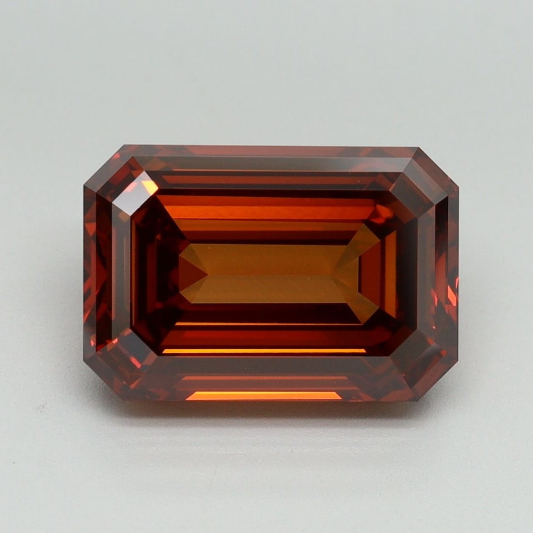 Loose Diamond - EMERALD 5.09ct Fancy Deep Orange VVS2: Loose Diamond - EMERALD 5.09ct Fancy Deep Orange VVS2 Source: This is a real non-mined Diamond that has been grown in a lab Shape: EMERALD Carats: 5.09 Color: Fancy Deep Orange Certification: IGI Vide