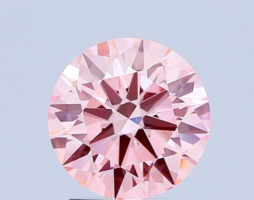 Ideal Loose Diamond - ROUND 1.99ct Fancy Vivid Pink VS1: Ideal Loose Diamond - ROUND 1.99ct Fancy Vivid Pink VS1 Source: This is a real non-mined Diamond that has been grown in a lab Shape: ROUND Carats: 1.99 Color: Fancy Vivid Pink Certification: IGI