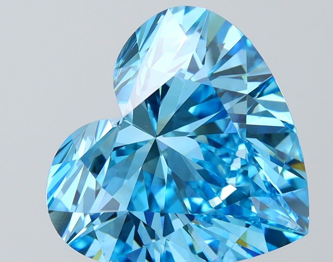 Loose Diamond - HEART 6.3ct Fancy Vivid Blue VS1: Loose Diamond - HEART 6.3ct Fancy Vivid Blue VS1 Source: This is a real non-mined Diamond that has been grown in a lab Shape: HEART Carats: 6.3 Color: Fancy Vivid Blue Certification: IGI Video: