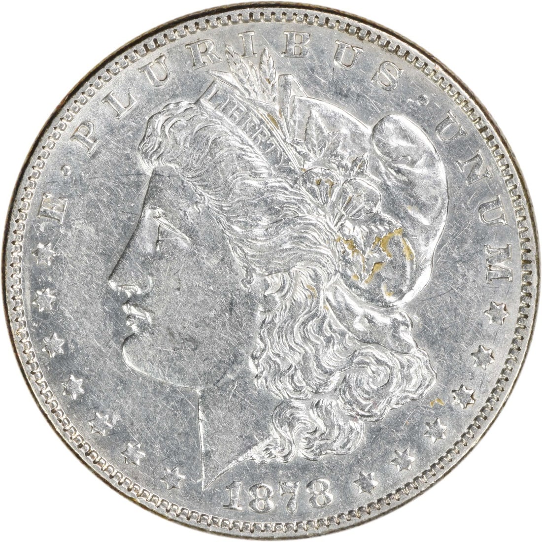 Circulated 1878 Morgan Dollar 7 Tail Feathers Reverse Uncertified AU: Circulated 1878 Morgan Dollar 7 Tail Feathers Reverse Uncertified AU This is an 1878 Morgan Silver Dollar featuring the 7 Tail Feathers Reverse of 1878. The coin is composed of 90% silver and 10% copp