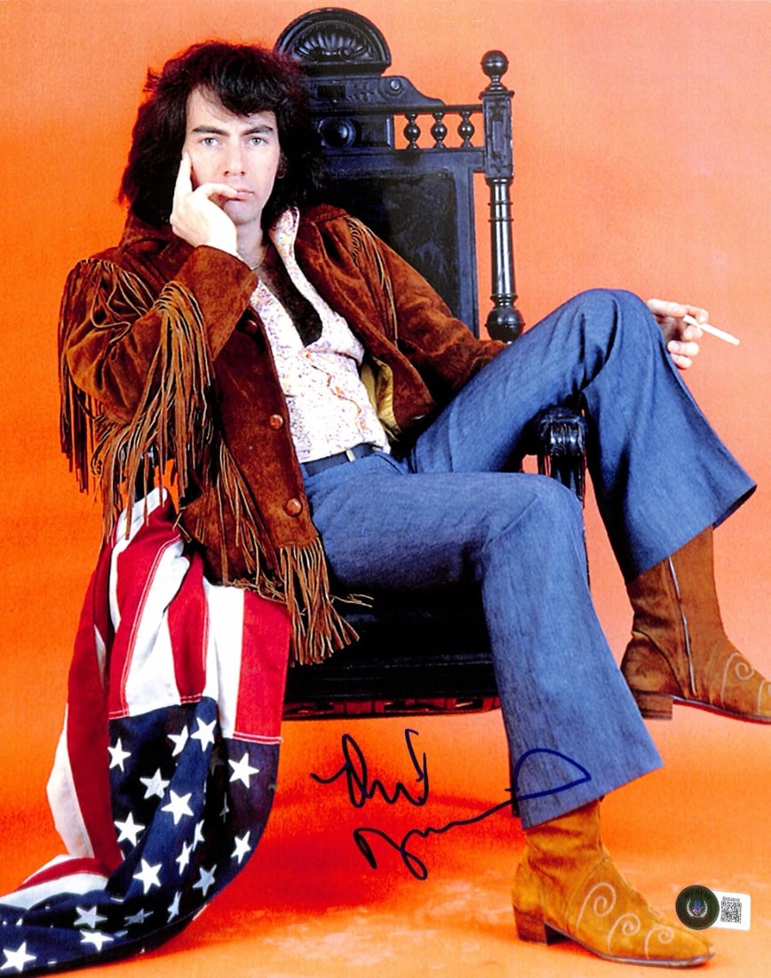 Neil Diamond Autographed 11x14 Photo Beckett Certified: Neil Diamond Autographed 11x14 Photo Beckett Certified This is an authentic, autographed 11x14 photograph of the legendary musician Neil Diamond, signed in blue permanent marker. The signature has bee