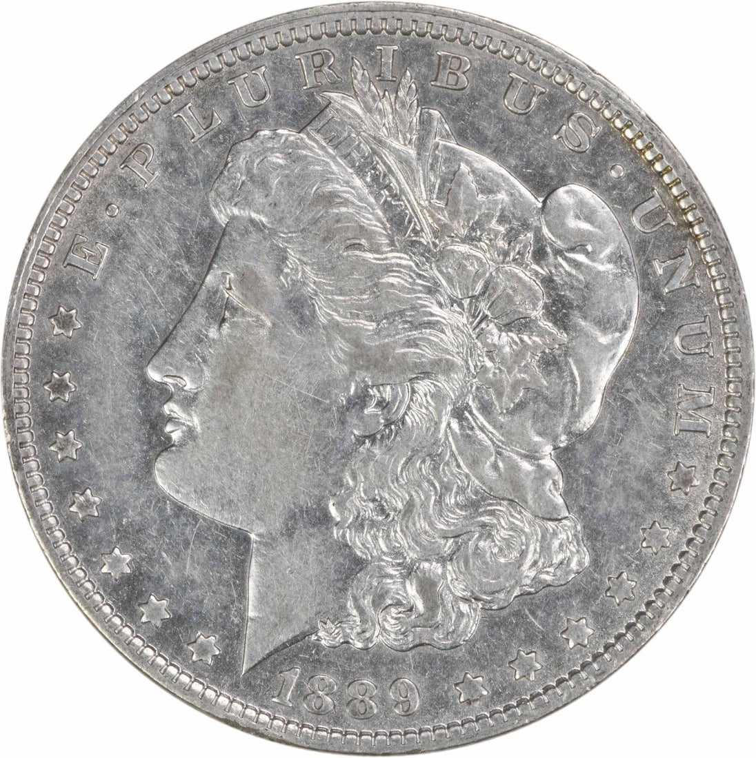 Morgan Dollar 1889 O New Orleans Mint 90 Percent Silver EF Grade Uncertified: Morgan Dollar 1889 O New Orleans Mint 90 Percent Silver EF Grade Uncertified This is an 1889-O Morgan Silver Dollar from the United States, minted in New Orleans. The coin is circulated and graded as