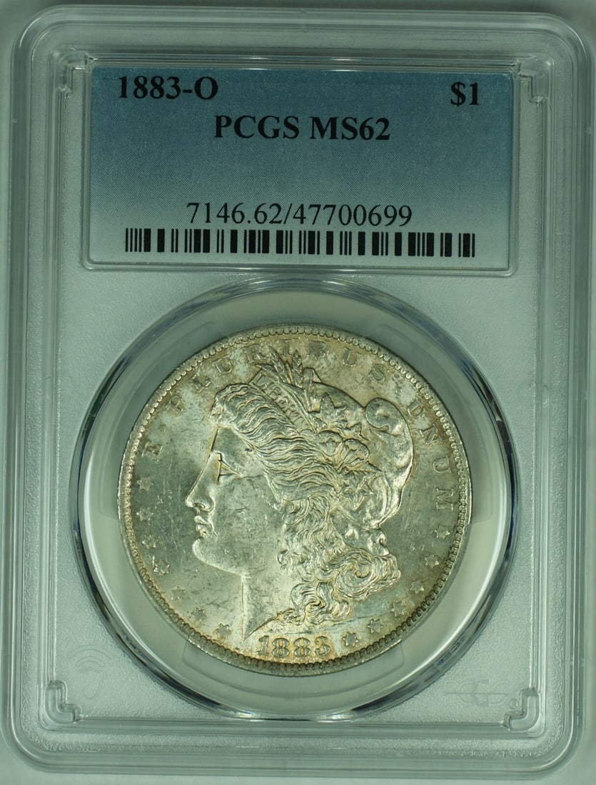 PCGS MS 62 1883-O Morgan Silver Dollar with Toning: PCGS MS 62 1883-O Morgan Silver Dollar with Toning This is an 1883-O Morgan Silver Dollar featuring attractive toning. The coin is certified by PCGS with a grade of MS 62, indicating an uncirculated c