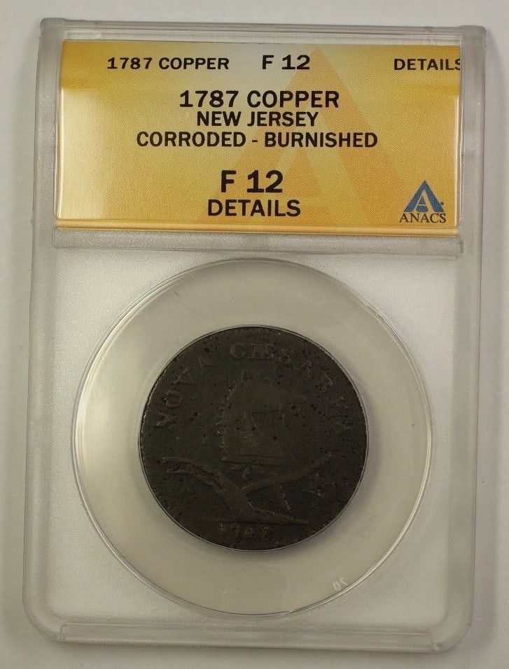 1787 New Jersey Large Planchette Copper Coin ANACS F-12 Details: 1787 New Jersey Large Planchette Copper Coin ANACS F-12 Details This is a 1787 US Colonial New Jersey Copper Large Planchett coin, graded F-12 Details by ANACS. The coin is circulated and made of copp