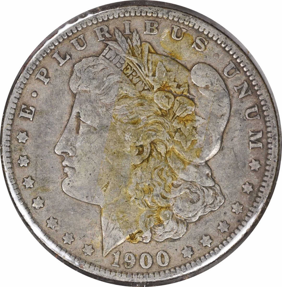 1900-O Morgan Silver Dollar VF 90% Silver Uncertified: 1900-O Morgan Silver Dollar VF 90% Silver Uncertified This 1900-O/CC Morgan Silver Dollar is a remarkable piece of numismatic history. It features a composition of 90% silver and 10% copper, showcasin