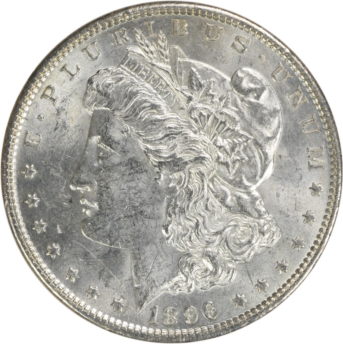 1896 Morgan Silver Dollar Uncertified Brilliant Uncirculated Coin: 1896 Morgan Silver Dollar Uncertified Brilliant Uncirculated Coin This 1896 Morgan Silver Dollar is a remarkable piece of numismatic history, featuring a brilliant uncirculated finish. It is composed