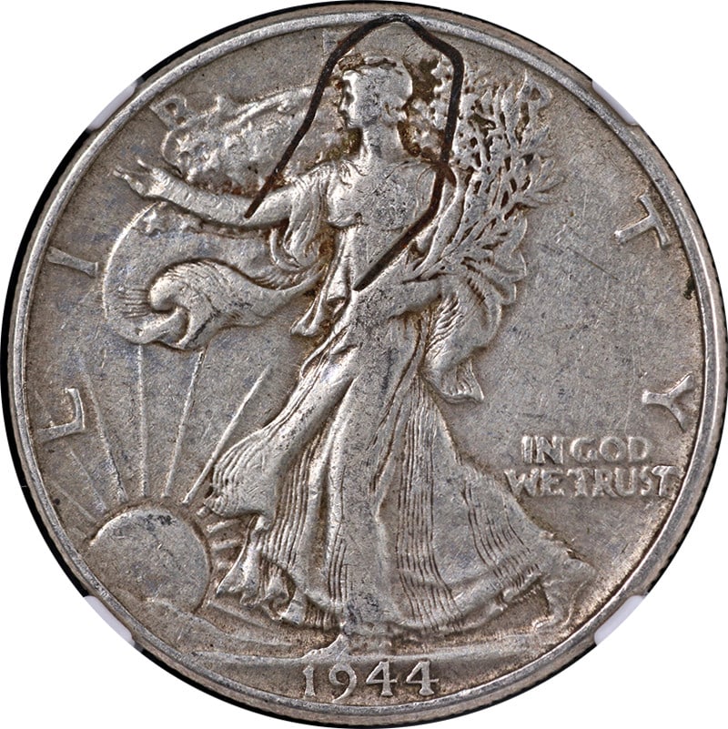 NGC XF40 1944 Walking Liberty Half Dollar Mint Error Struck With Staple: NGC XF40 1944 Walking Liberty Half Dollar Mint Error Struck With Staple This is an original 1944 Walking Liberty Half Dollar certified by NGC with a grade of XF40. The coin features a rare mint error,