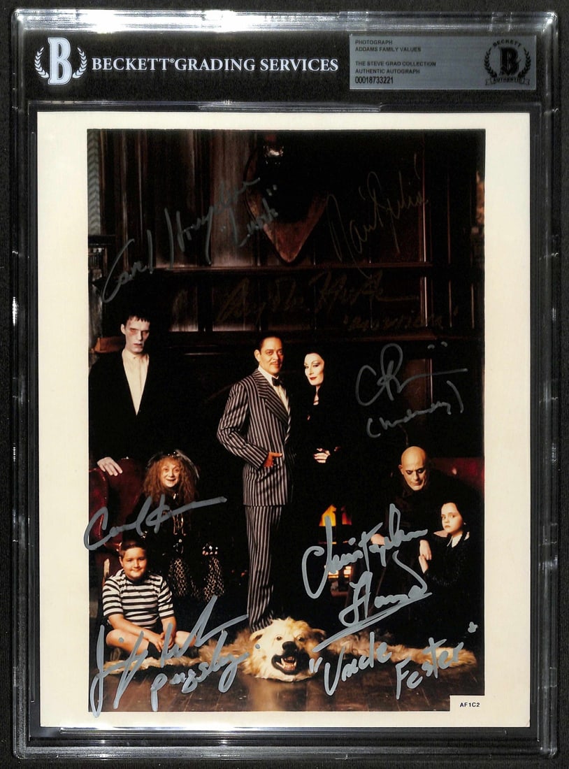 Addams Family Values Cast 8x10 Photo Signed by 7 with Raul Julia BECKETT LOA: Addams Family Values Cast 8x10 Photo Signed by 7 with Raul Julia BECKETT LOA This remarkable 8x10 color photo from the film *Addams Family Values* is hand-signed by seven principal cast members, inclu