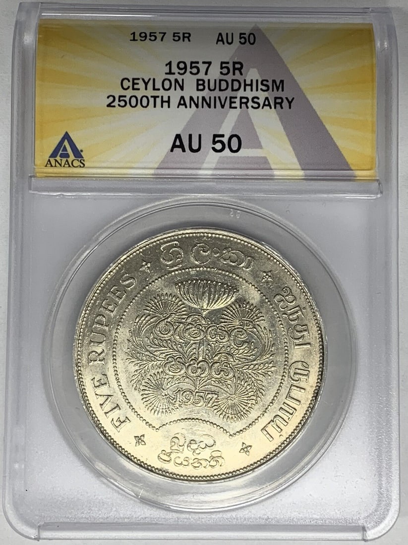 2500th Anniversary 1957 Ceylon 5 Rupee Buddhism Coin ANACS AU 50: 2500th Anniversary 1957 Ceylon 5 Rupee Buddhism Coin ANACS AU 50 This 1957 Ceylon Buddhism 5 Rupee coin commemorates the 2500th anniversary and has been certified by ANACS with a grade of AU 50. It or