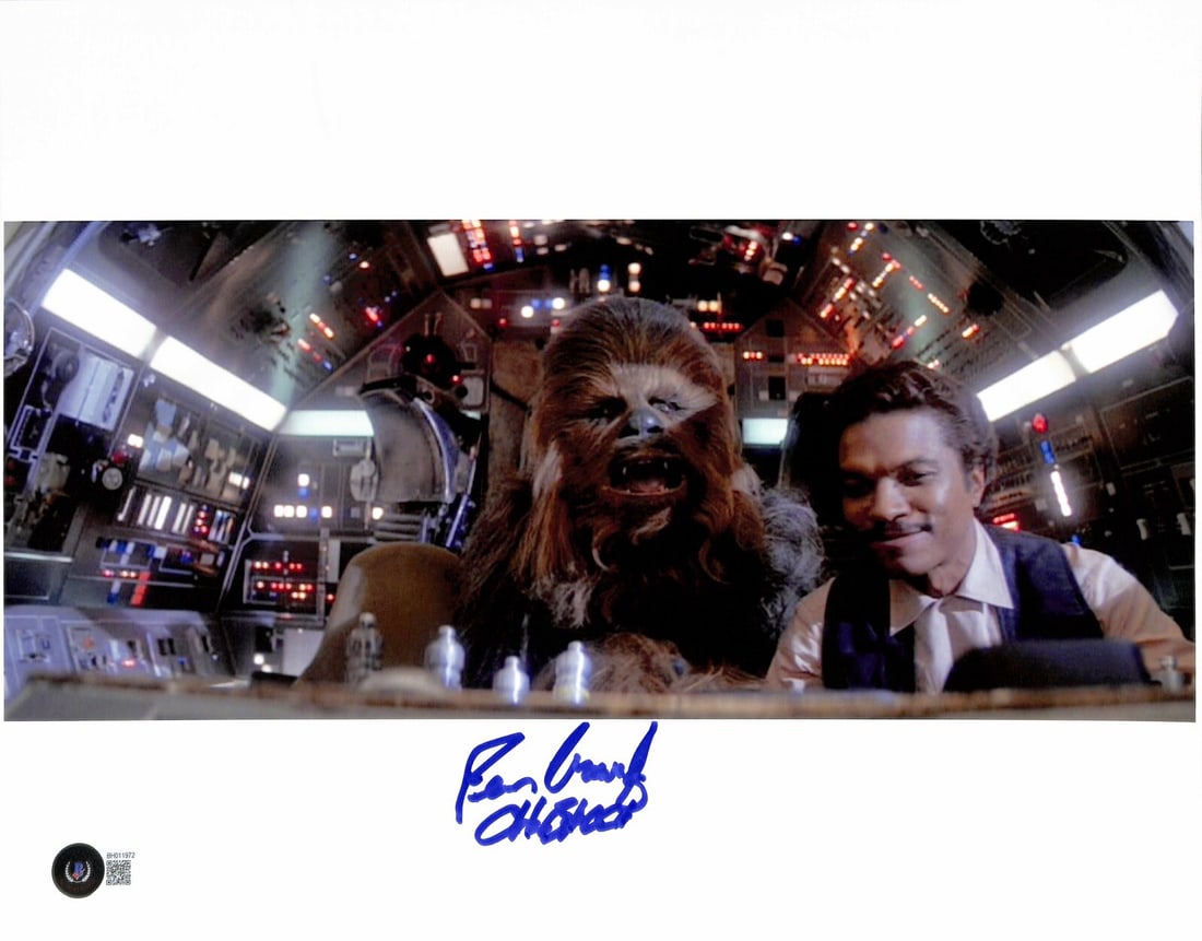 Peter Mayhew Signed Chewbacca Photo 11x14 Beckett Certified: Peter Mayhew Signed Chewbacca Photo 11x14 Beckett Certified This impressive 11x14 photograph features a blue permanent marker autograph from Peter Mayhew, who famously portrayed the iconic Wookiee Che