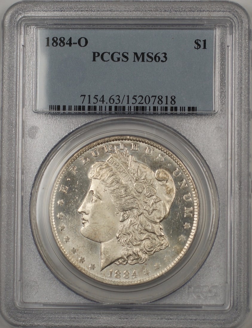 PCGS MS-63 1884-O Morgan Dollar New Orleans Mint Silver Proof Like: PCGS MS-63 1884-O Morgan Dollar New Orleans Mint Silver Proof Like This is an 1884-O Morgan Silver Dollar graded MS-63 by PCGS. The coin is uncirculated and features a proof-like appearance. Minted in