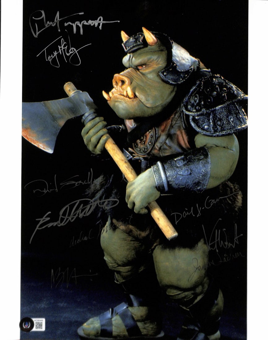 11x14 Gamorrean Guard Photo Signed by 9 ILM Team with Beckett LOA: 11x14 Gamorrean Guard Photo Signed by 9 ILM Team with Beckett LOA This is an original 11x14-inch photograph featuring the Gamorrean Guard as seen in the Star Wars universe. The photograph is hand-sign